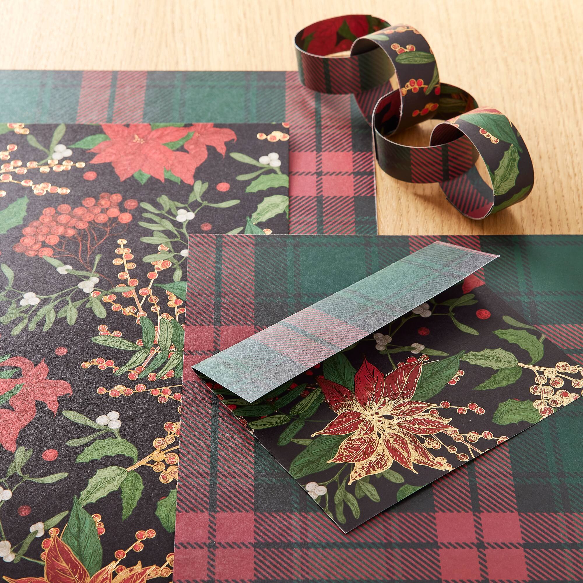 24 Pack: Poinsettia Plaid Double-Sided Cardstock Paper by Recollections™, 12" x 12"
